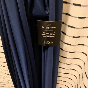 Floor length navy multi-way formal dress.